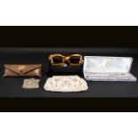 Helmecke Designer Retro Sunglasses tortoiseshell plastic frames.