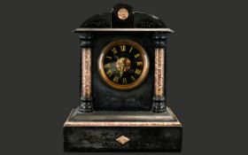 A Belgian Black Slate Architectural Clock Finished with Rosso marble pillars and inserts,