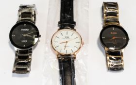 Three Gents Fashion Watches. One With Leather Strap And The Others Stainless Steel.