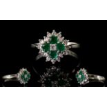 Ladies 18ct White Gold Attractive Emerald and Diamond Cluster Ring, Flower head Design. Marked 18ct.