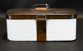 Enamel Tiffin Tin Of rectangular form with white enamel body and copper patinated top.