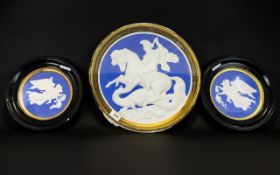 Pate Sur Pate A Collection Of Three Wall Plaques Three relief moulded circular plaques.