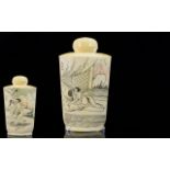 An Oriental Snuff Bottle The whole engraved with erotic scenes, 3.5 inches in height.
