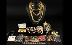 A Mixed Box Of Contemporary Costume Jewellery A large lot containing various watches, faux pearls,