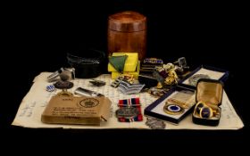 A Varied Collection Of Military Ribbons Medals And Badges A mixed lot to include Royal Navy