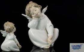 Lladro Hand Made Porcelain Figure. 'Angel Dreaming' No 4961, Sculptor Alvador Debón.