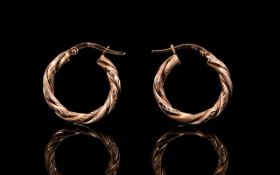 9ct Rose Gold Pair of Hoop Earrings with Twist Design. Marked .375 - 9ct. As brand new condition.