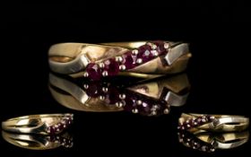Ladies - Two Tone 9ct Gold Rubies Set Dress Ring. Fully hallmarked for 9.375.