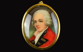 Hand Painted Portrait Miniature Housed in convex glass and gold tone oval frame,
