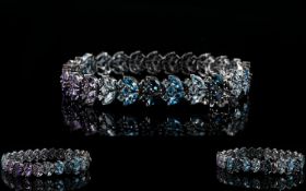 Shades of Blue Topaz and Purple Amethyst Bracelet, a 14.5ct line of clusters in the formation of Sky