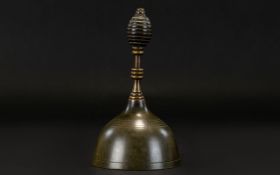 Antique Brass Bell Of domed form with aged patina and textural handle. Height, 5.5 inches.