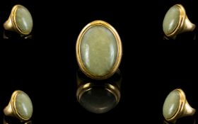 18ct Gold Single Stone Oval Shaped Chalcedony Set Dress Ring.