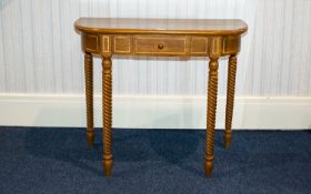 A Modern Yew Wood Console Table Comprising single frieze drawer above barley twist supports.