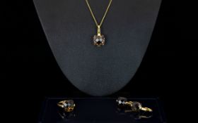 A Contemporary Silver Vermeil And Smoky Topaz Jewellery Suite Comprising pendant necklace,