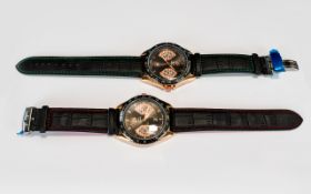 Two Gents Fashion Wrist Watches Both With Stainless Steel Backs And Leather Straps