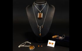 A Collection Of Sterling Silver And Mixed Metal Amber Tone Jewellery Seven items in total,