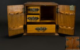 Oak Early 20th Century Smokers Cabinet Solid door fronts with fitted interior comprising two short