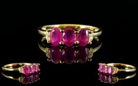 Ruby and White Topaz Ring, a trio of ova