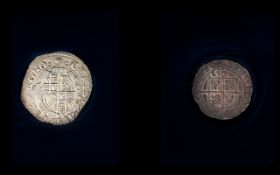 Elizabeth I 1596 Shilling In worn condition, readable. Together with a re-strike coin.