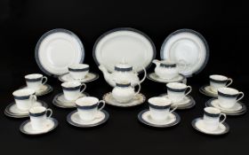 Royal Doulton Part-Service 'Sherbrooke' in white with decorative blue/grey edging.