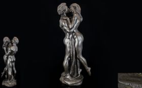 Heredity Bronzed Resin Figure by R. Cameron titled 'The Embrace' circa 1990s. Stands 14.25" 36.