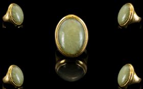 18ct Gold Single Stone Oval Shaped Chalcedony Set Dress Ring. The Cabochon Cut Chalcedony of Sage