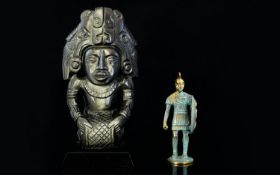 A Carved Hematite Figure In the form of a Mayan deity, 10 inches in height.