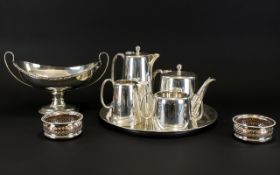 A Silver Plated Tea Set And Accompanying Tray Four piece set of typical form.