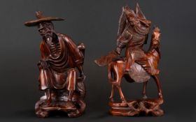 A Pair Of Oriental Carved Figures Hand carved figures,
