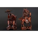 A Pair Of Oriental Carved Figures Hand carved figures,