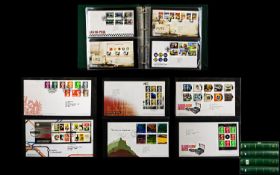 Four green Leuchtern Kabe stamp albums with more modern first day covers with many coil,