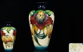 Moorcroft Modern Tube lined Vase ' Arum Lily ' Design. Designer Walter Moorcroft. Height 6.