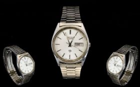 Seiko SQ Quartz Stainless Steel Gents Wrist Watch. No 906342 7123 - 8290.P. Date / Day Display,