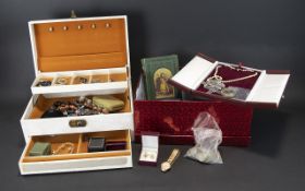 A Vintage Jewellery Box Containing Various Silver And Costume Jewellery Items Cream faux leather