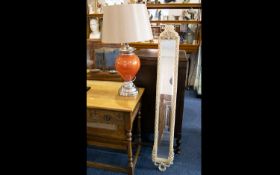 Modern Decorative Table Lamp orange bulbous stem on chrome circular base with sheer ivory coloured