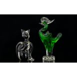 Two Murano Glass Figures the first in the form of a seated cat in smoked glass,