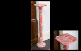 Marble Jardiniere Stand Fashioned from bright rose marble with octagonal base and square top,