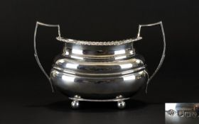 Early 20th Century Twin Handle Sugar Bowl Of Plain form with cannonball feet, gadrooned edge,