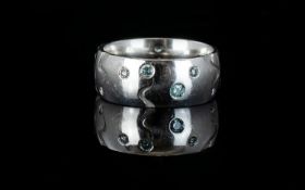 Contemporary Designed 18ct White Gold Band Ring Set with Blue and White Diamonds. Fully Hallmarked
