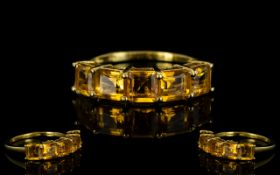 Citrine Five Stone Band Ring, five octagon cut citrines, each of .