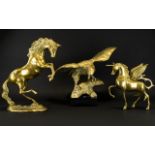 A Collection Of Brass Ornaments Comprising bird of prey, unicorn and prancing horse.