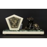 Art Deco Marble Figural Mantle Clock Raised on rectangular base of cream and moss green veined