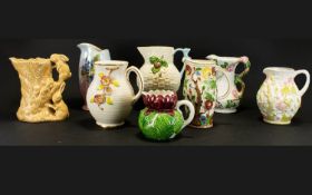 A Collection Of Eight Moulded 1930's Jugs To include Sylvac, Royal Winton, Shorter & Son,