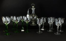 Glass Decanter Set comprising glass decanter and 6 wine glasses.