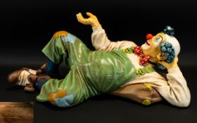 Circus Interest - Large Fibreglass Clown Figure. Signed To Suitcase. Length 24 Inches.