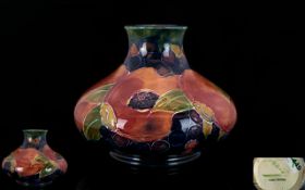 William Moorcroft Signed Squat Shaped Vase ' Ochre Pomegranate ' Design. c.1915 - 1925.