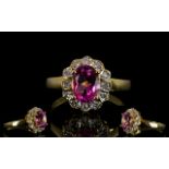 18ct Gold Diamond Dress Ring Set with central pink gemstone,