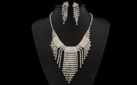White Austrian Crystal Waterfall Necklace and Earring Set, three curved, linked panels of crystals