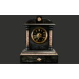 A Belgian Black Slate Architectural Clock Finished with Rosso marble pillars and inserts,