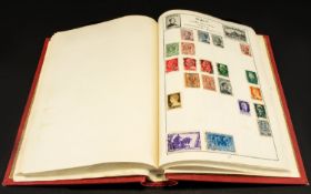 Red springback Movaleaf stamp album full of world wide stamps.